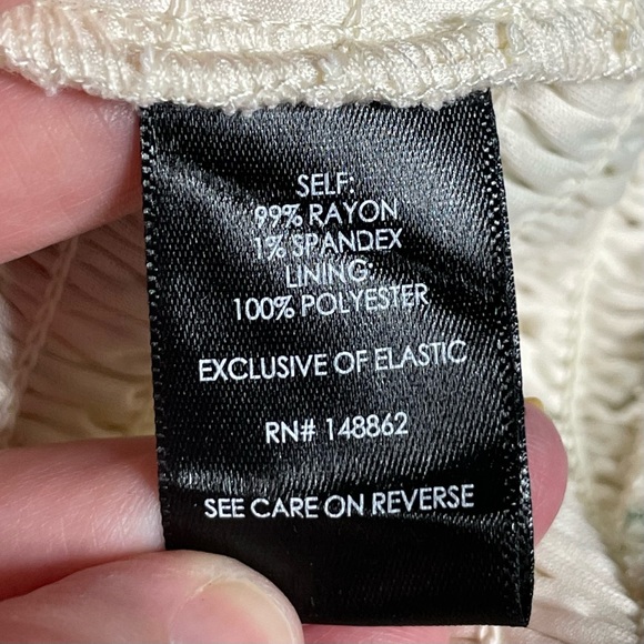 Torrid 1 SMOCKED FLUTTER SHORT SLEEVE CROP TOP in Warm Sunset Floral - Picture 6 of 7